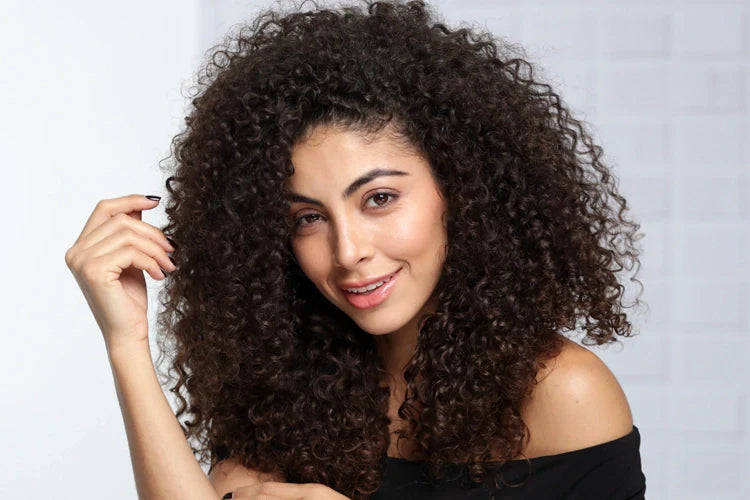 Grow Longer, Stronger Curly Hair | Ouidad