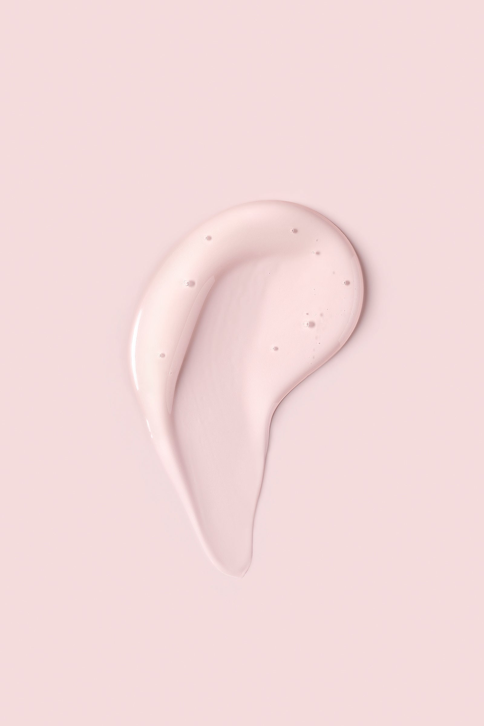 Portion of clear Advanced Climate Control® Heat & Humidity Gel on pink background