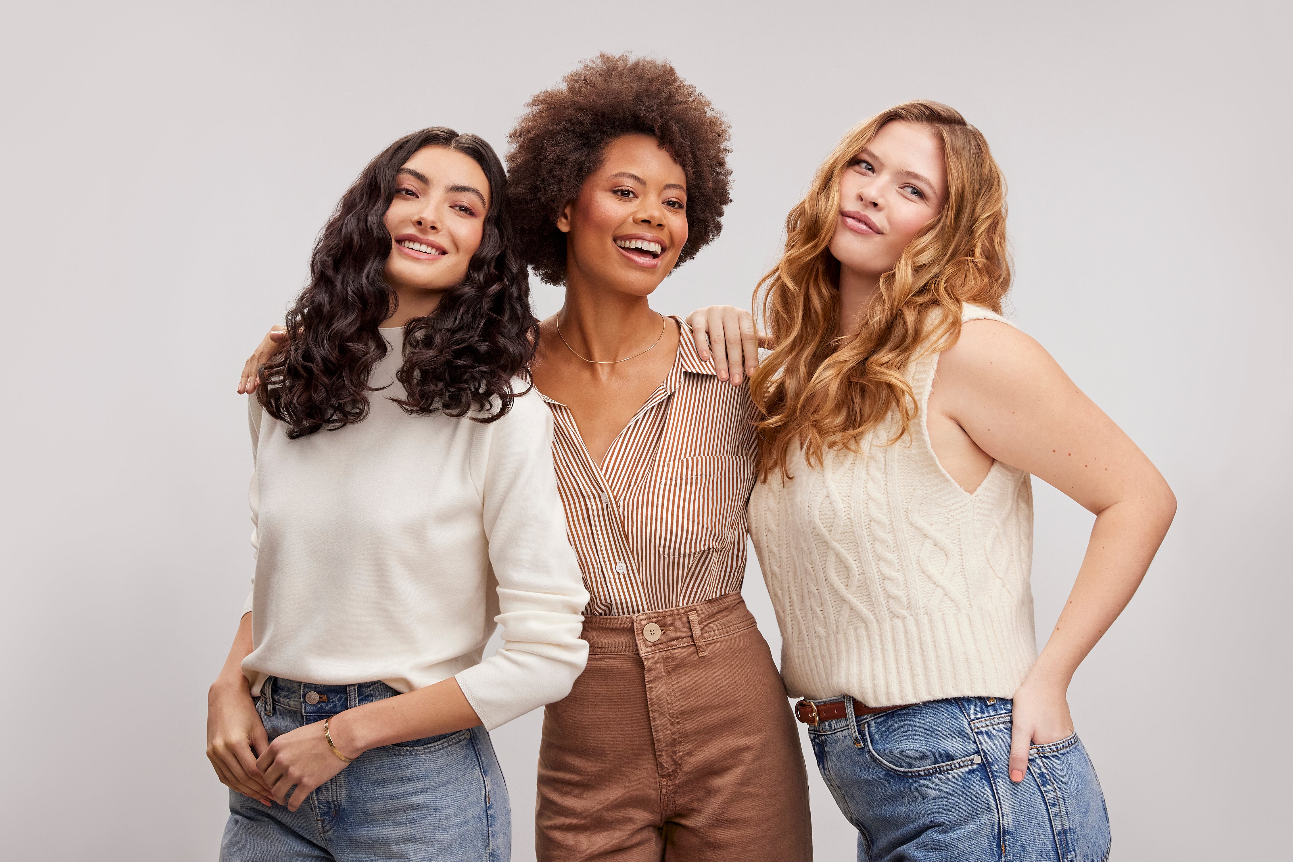 3 models with curly hair