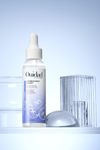 Image of Unbreakable Bonds Mixing Drops next to some decorative abstract glass objects.