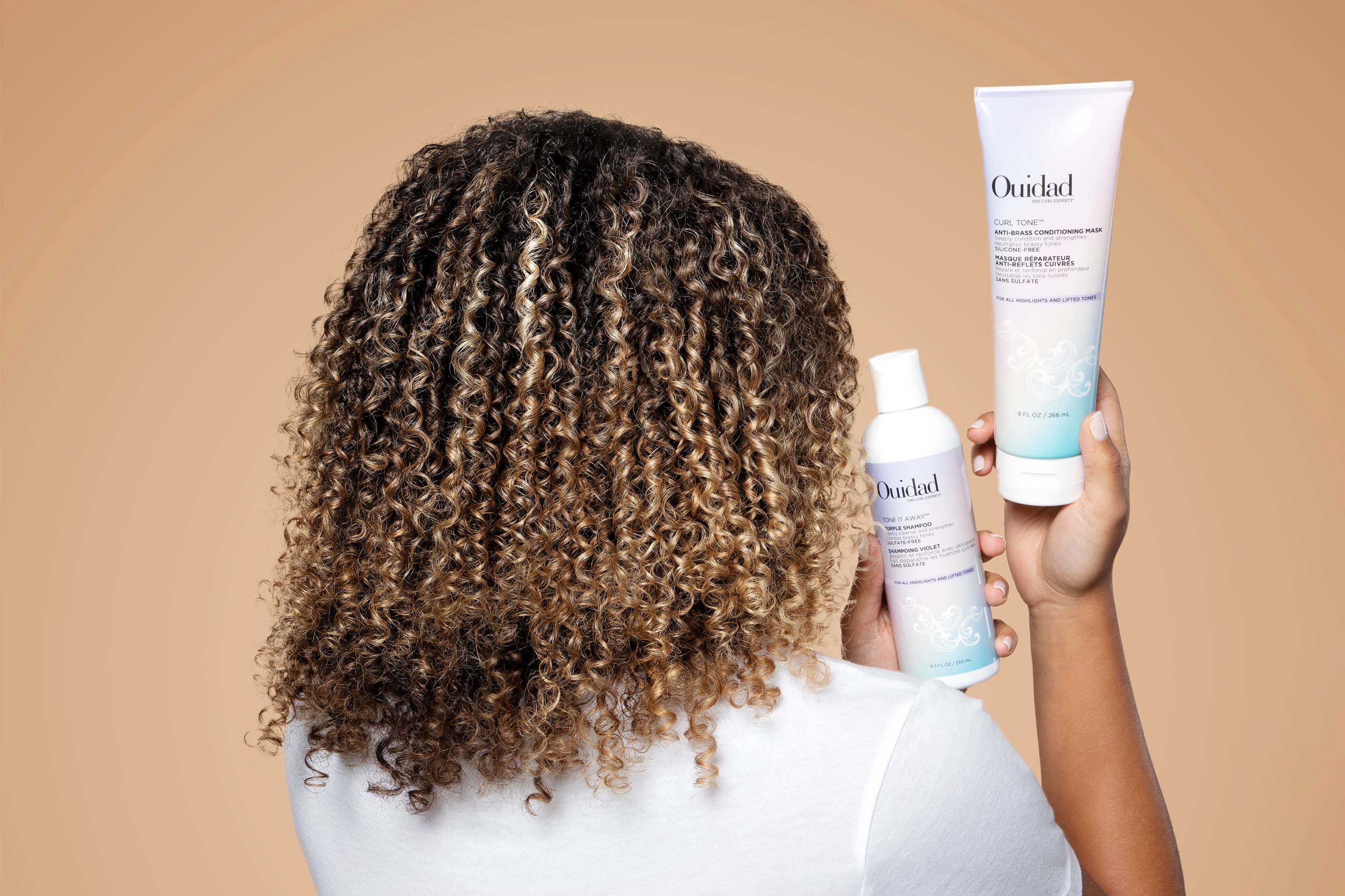 Model holding Color Care Products