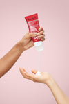 Hand squeezing portion of Advanced Climate Control® Featherlight Touch-Up Gel Cream into hand
